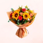 Flores Primaverales con 4 Girasoles y 6 Rosas Rojas